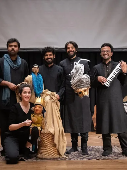 The full ensemble of 'Buried Treasures' with our beloved puppets. This photo captures the collaborative energy and playful spirit of our French-Indian team, bringing together diverse artistic talents on one stage.