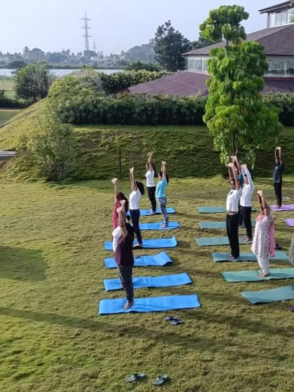 A wider view of our International Yoga Day celebration. The collective energy of a group practicing together in such a serene environment is powerful and uplifting.