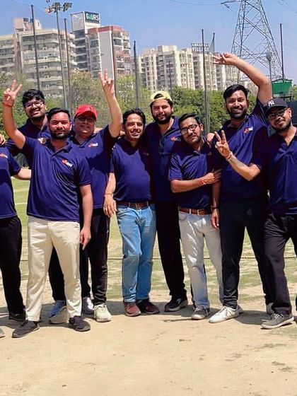 The winning team celebrating after a thrilling company cricket match. Victory and unity go hand in hand at Syrotech.