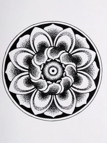 A stippled floral mandala from my Inktober challenge. The shading is achieved entirely by placing tiny dots, a technique that requires patience but creates a beautiful, soft texture.