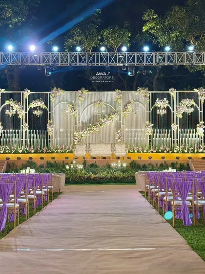 The grand aisle leading up to the stage, offering a breathtaking first view for guests and creating a perfect path for the couple's entrance.