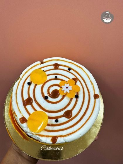 A beautiful New York-style baked cheesecake with a caramel swirl. This is a rich, creamy, and indulgent dessert that I learned to perfect at pastry school.