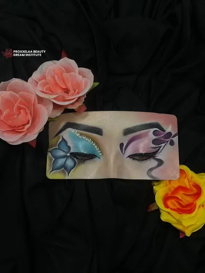 Eyes speak louder than words. This beautiful eye board practice showcases a floral and butterfly-inspired look, blending soft colors with artistic details.
