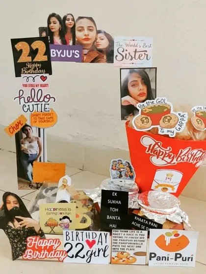 For the foodie, this unique 22nd birthday hamper features a Pani Puri bouquet as the centerpiece. It's a fun, quirky, and delicious way to celebrate, surrounded by personal photos and notes.
