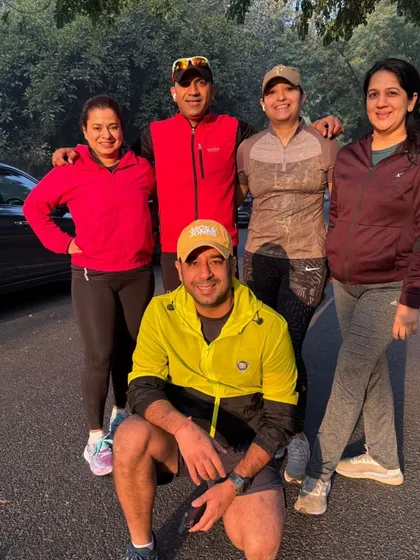 The gang posing together. These photos are a testament to the friendships built on the running trail.