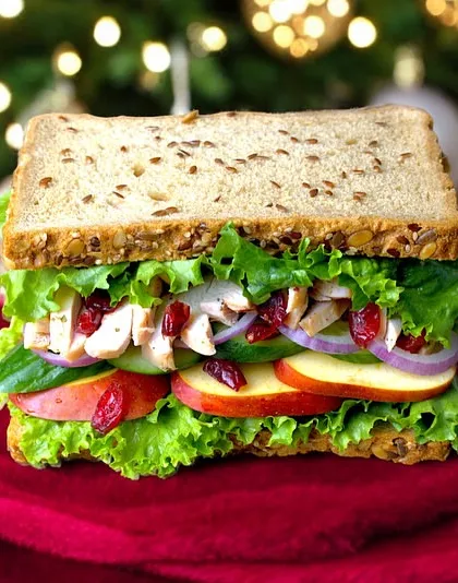 Our special Christmas sandwich, filled with chicken, crisp apples, and cranberries. It's a festive treat that brings the holiday spirit to your plate.
