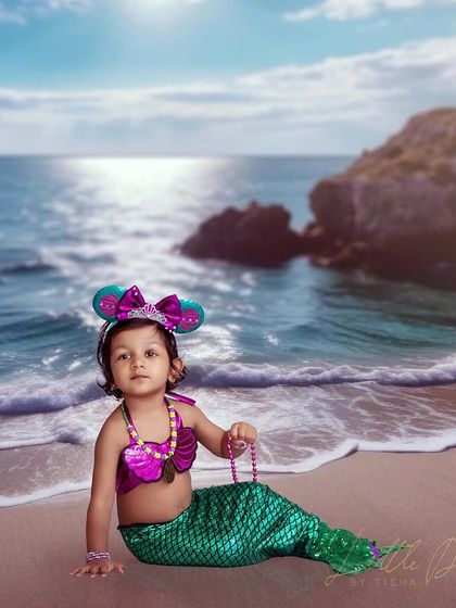 Our little mermaid on a magical beach. I can create different fantasy scenes to make your child's portrait session truly one of a kind.