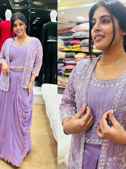 Our popular drape saree with an embroidered jacket, now in a lovely lilac color.