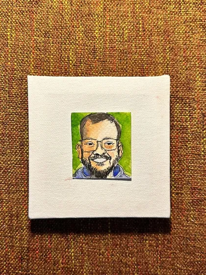 A flat lay of my mini portrait of Chintan.