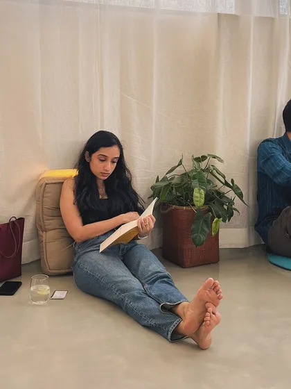 Finding a quiet spot on the floor to get lost in a book. Our Studio space is perfect for these moments of calm and focus.