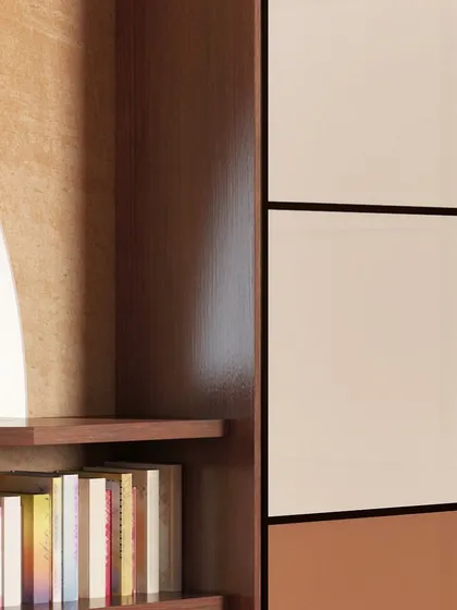 This conceptual image shows how a wardrobe can be integrated next to a bookshelf, with multi-toned panels adding a graphic element to the design.