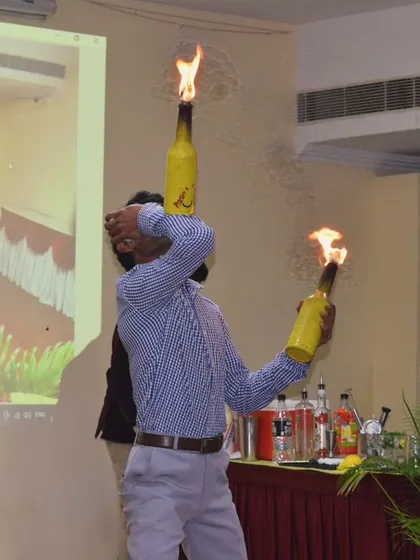 Fire flair is one of the most exciting parts of exhibition bartending. Here's a look at a performance during one of our workshops, demonstrating the high-energy showmanship we teach our students for events and competitions.