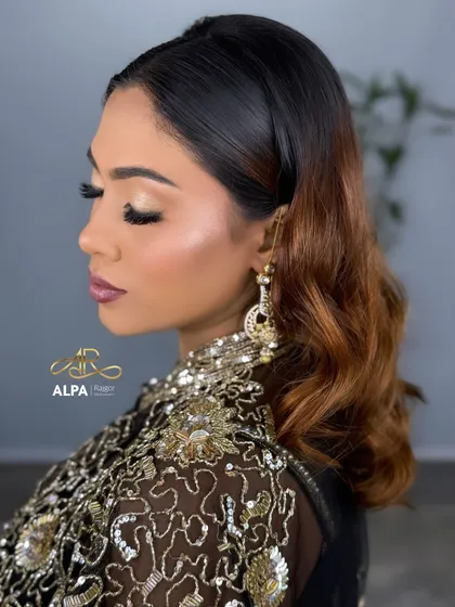 A beautiful side profile of the complete look, demonstrating the balance between hair and makeup.