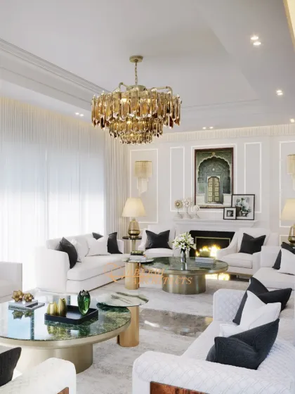 A grand view of the all-white living room, featuring a magnificent chandelier, a classic fireplace, and multiple seating areas for large gatherings.