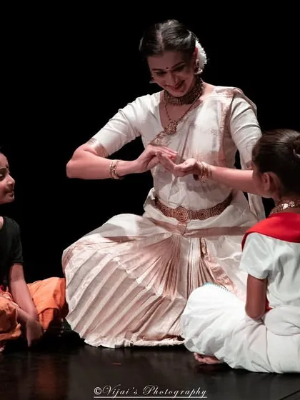The easiest way to teach abhinaya (expression) to young children is through storytelling. Here, I am interacting with two of my youngest students on stage, using a narrative to evoke emotion.