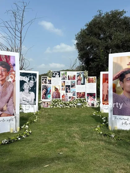 The full outdoor photo gallery, creating a stunning and emotional backdrop for a very special question.