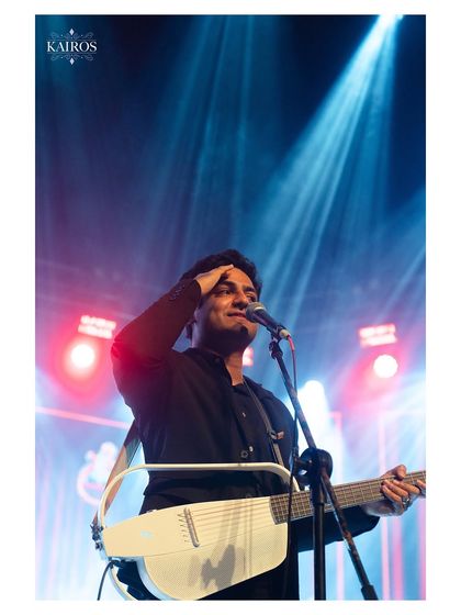 An actor or stand-up comedian engaging with the audience. I capture the expressive gestures and emotions that are key to a compelling performance.