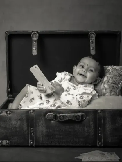 Some memories are meant to be black and white and beautiful, like this baby packed in a vintage suitcase.