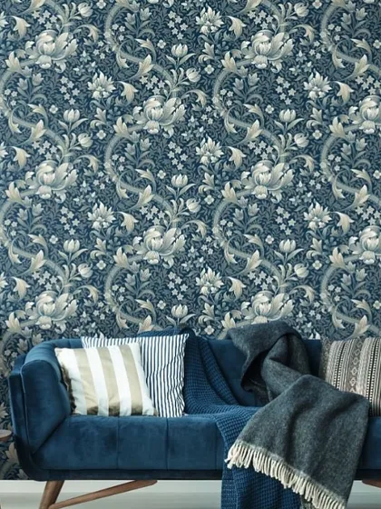 The Heritage Prints collection from Wallquest blends trendy colors with a modern take on classic Arts & Crafts inspired designs. This intricate blue and beige floral damask creates a sophisticated and timeless living space.