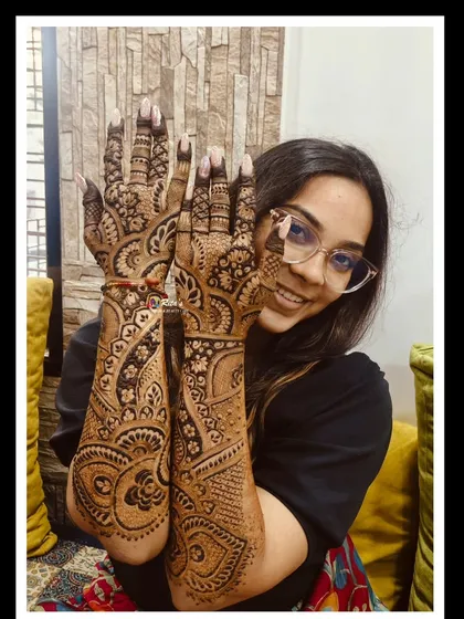 Another pose showing the full beauty of the intricate design, perfect for a special family occasion like a brother's wedding.
