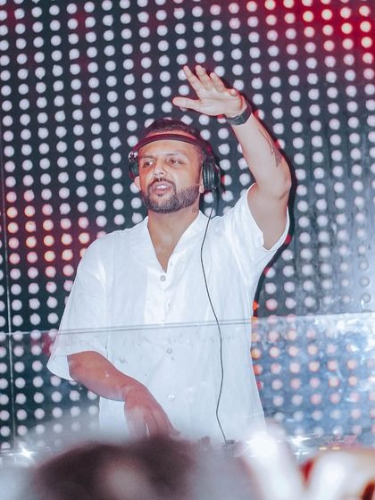 Do your stuff like no one's watching. A candid shot of me behind the decks, feeling the music.