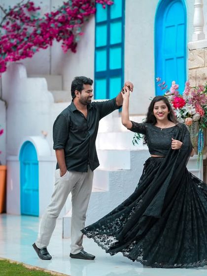 Another angle of the couple dancing on the Santorini set, showcasing its versatility for dynamic shots.