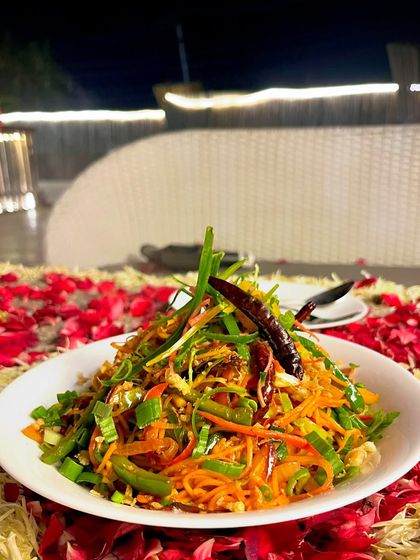 Spice up your evening with our Chili Garlic Noodles, loaded with fresh vegetables and a fiery sauce.