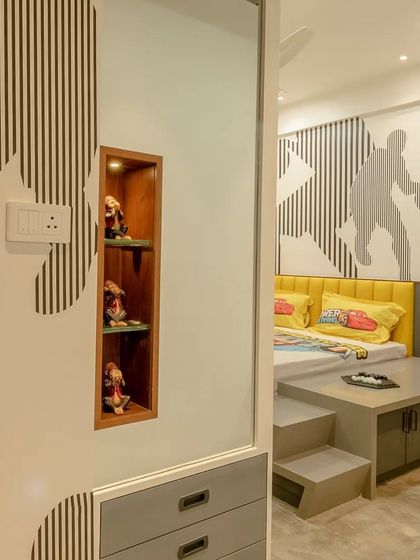 A glimpse into a basketball-themed kid's room, where we used graphic patterns and a custom multi-level bed platform to create a fun and energetic space.