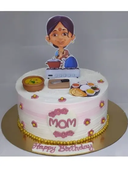 A cake for the best Mom, celebrating her love for cooking. This custom eggless chocolate roasted almond cake features fondant toppers of Indian dishes and a kitchen setup.