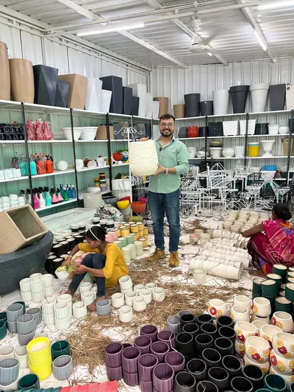A wide view of my nursery floor, bustling with activity as we unpack and sort a fresh collection of beautiful pots for every home and garden.