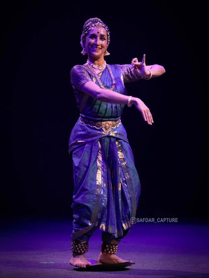 Another view of the Tarangam, showing the focus and control needed for this intricate part of the performance.