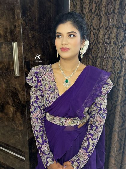 This client from Australia chose me for her family event. I created a sophisticated look with a focus on flawless skin and elegant eyes, paired with a modern saree and diamond jewelry.
