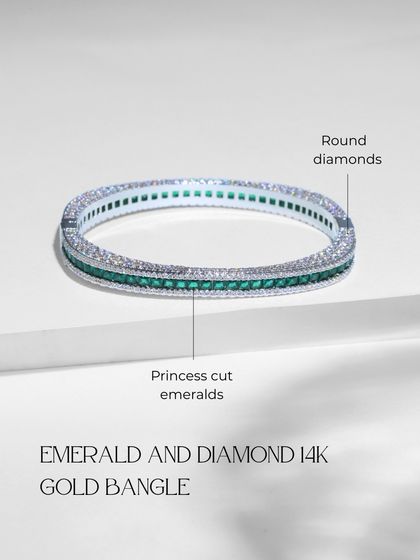 A detailed view of the emerald and diamond bangle, clearly labeling the princess-cut emeralds and round diamonds that create its striking geometric pattern.