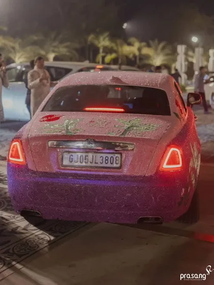 The rear view of the stunning, crystal-encrusted Rolls Royce, a perfect chariot for a modern-day royal couple. This is an example of the luxury logistics I manage.