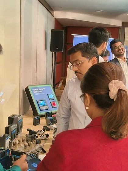 Attendees at my Bombay seminar getting a hands-on look at my power quality and metering solutions.