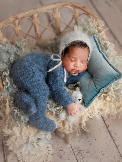 A symphony of blues from a different angle. This overhead shot shows the beautiful textures and colors of the setup, with the baby sleeping soundly.
