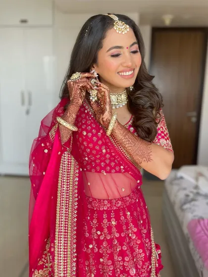 A candid shot of the happy bride, her hair looking perfect.