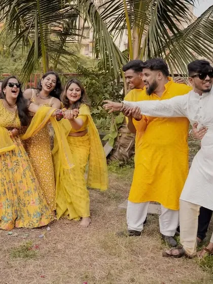 The "team groom" and "team bride" having a blast during the Haldi. I love capturing the fun rivalry and group dynamics.