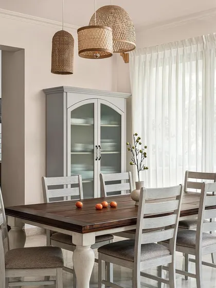 A shot from the India Today Home feature of my 'Under the Sun' project. This image showcases the dining area with its vintage-style crockery unit and beautiful wicker pendant lights.