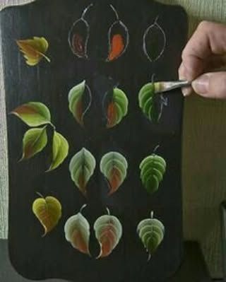 A guide to decorative painting, this image shows the step-by-step process of creating realistic leaves with specific brushstrokes.
