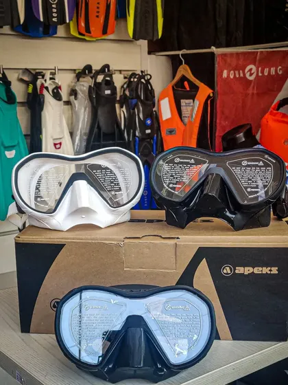 A selection of Apeks VX1 masks in black, white, and grey on display in our store. Having different colors allows divers to personalize their gear setup while enjoying the same high-performance features.