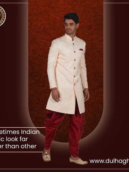 An Indian ethnic look that is far better than others. This cream sherwani paired with maroon dhoti pants offers a unique and stylish silhouette.