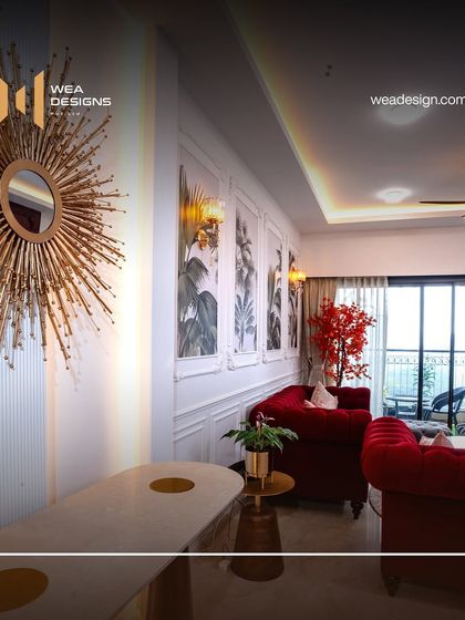 A dramatic shot highlighting the interplay of light and shadow in the Sobha Royal Pavilion living room, emphasizing the sunburst mirror and wall decor.