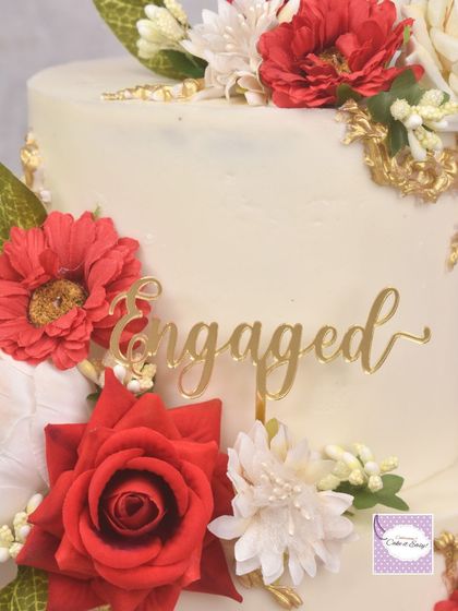 Another detail shot of the engagement cake's floral arrangement.