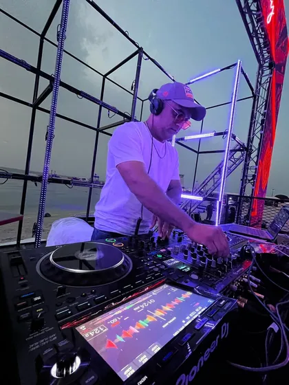 A closer look at my setup during the beachside sundowner event. You can see the professional Pioneer DJ gear and the intricate lighting rig, proving that I bring a full-scale production to any location.