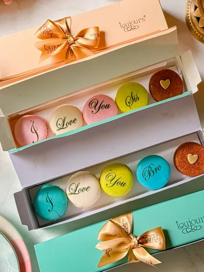 Elegant boxes of French macarons, customized with messages like "I Love You Sis" and "I Love You Bro" for Rakshabandhan. This highlights my ability to create personal and meaningful gifts that speak directly from the heart.