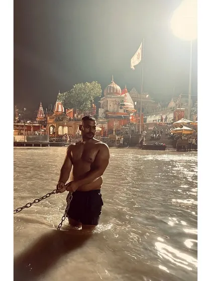 A night dip in the Holy Ganga River at Har Ki Pauri, Haridwar. The atmosphere here is pure energy.