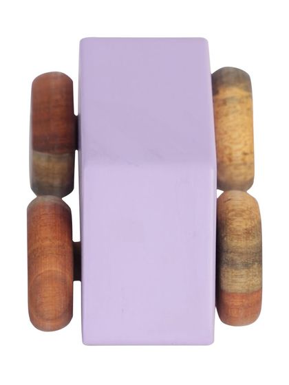 A top-down view of a purple wooden toy car.