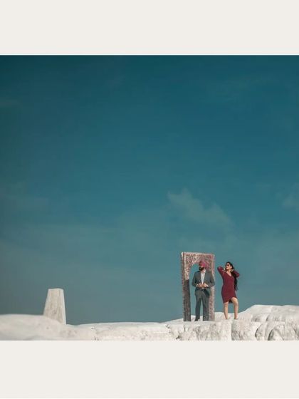 A playful and creative shot using a prop door in the middle of a vast, open landscape. We love incorporating unique ideas to make your shoot one-of-a-kind.