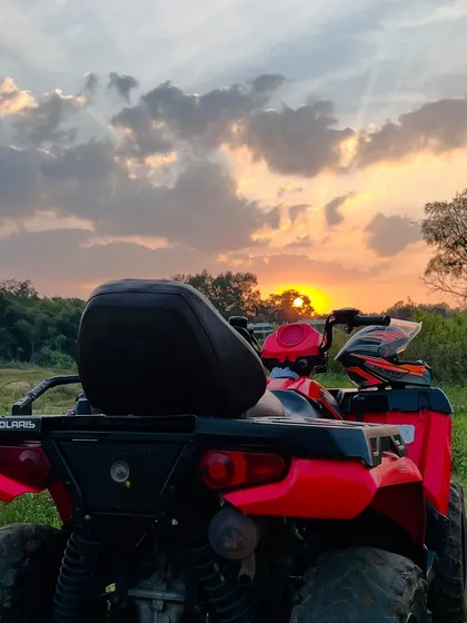 It’s not just about the ride, it’s about where the ride takes you. We’ll pause at scenic spots like this to catch a beautiful sunset over the forest. This is the perfect end to an adrenaline-filled day.